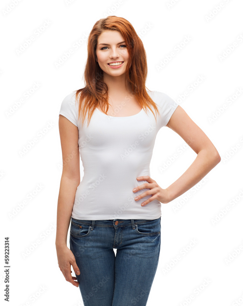 Fototapeta premium smiling teenager in blank white t-shirt