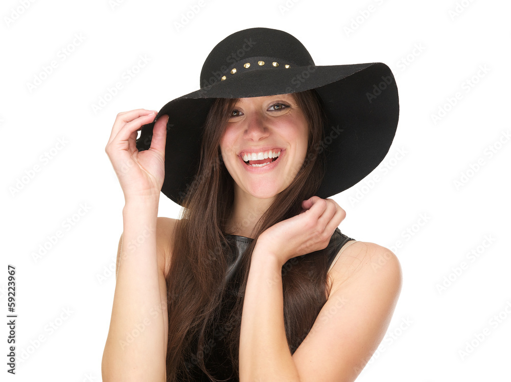 Beautiful young woman wearing black hat and laughing Beautiful young woman wearing black hat and laughing