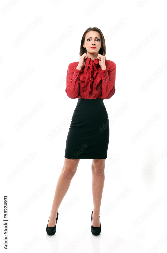 Fototapeta premium Confident business woman pulling on her collar