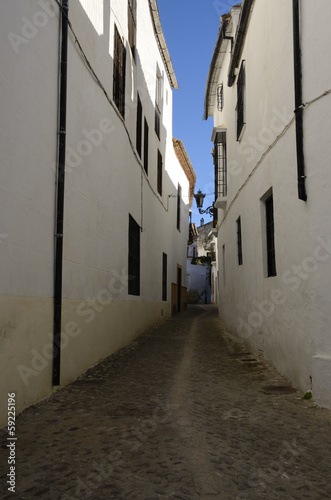 White street in Ronda, Andalusia, Spain © monysasi