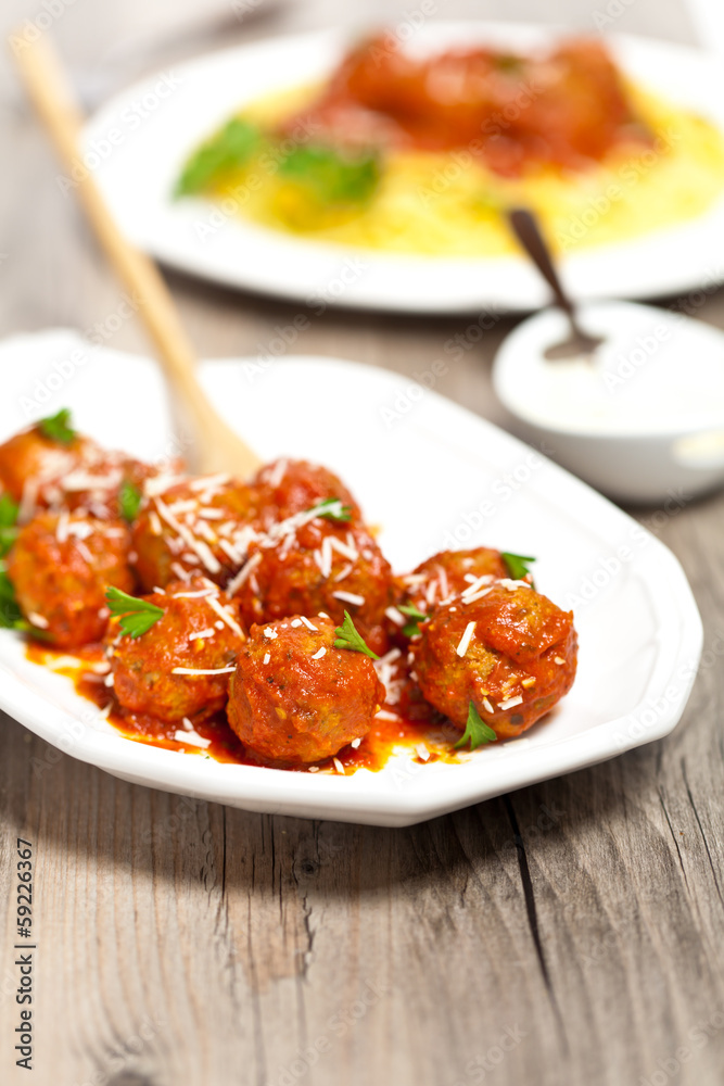 Meatballs in tomato sauce with parsley Meatballs in tomato sauce with parsley