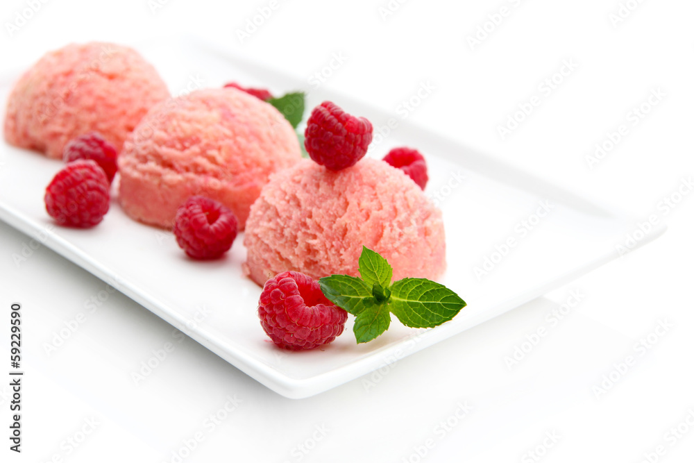 Delicious ice cream on plate isolated on white Delicious ice cream on plate isolated on white