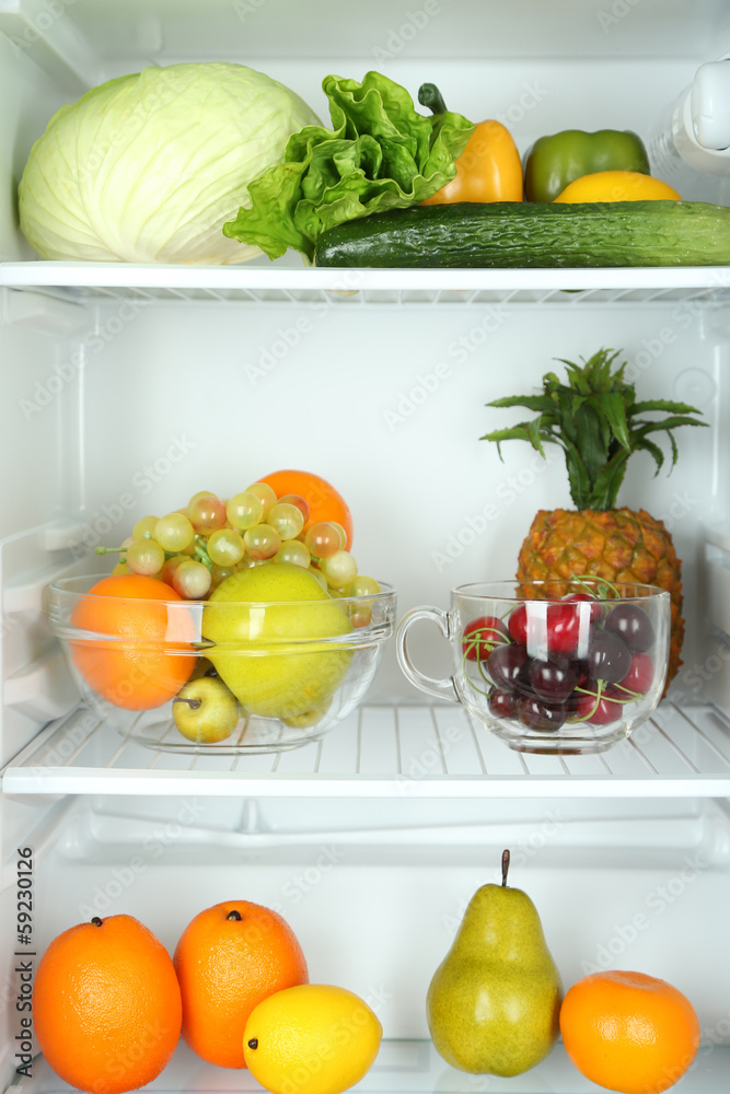 Vegetables and fruits in open refrigerator. Weight loss diet Vegetables and fruits in open refrigerator. Weight loss diet