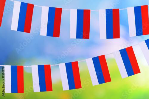 Garland of flags on bright background