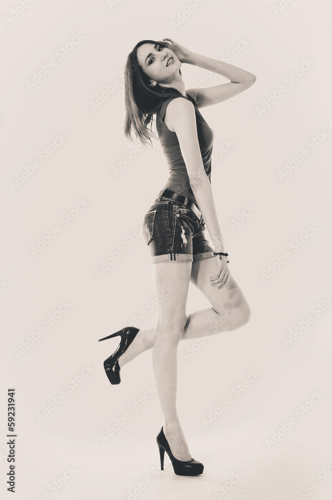 Stock image of casual young woman isolated full shot Stock image of casual young woman isolated full shot