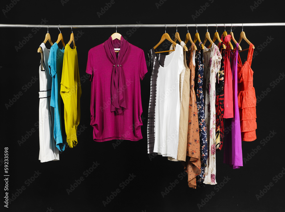 Female Variety of sundress clothes hanging on the rack