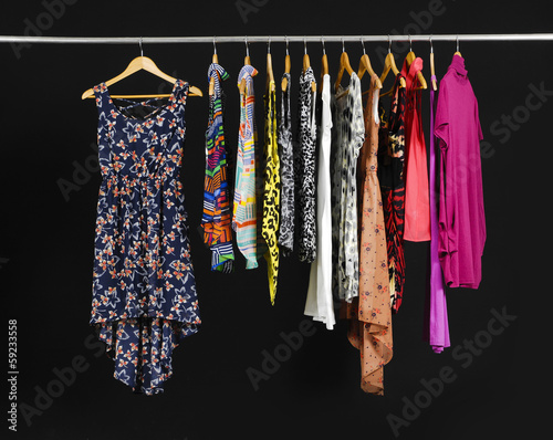Female Variety of sundress clothes hanging on the rack