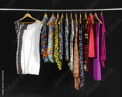 Female Variety of clothes hanging on the rack