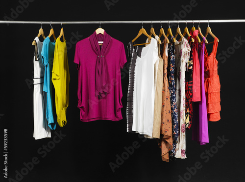 Female Variety of sundress clothes hanging on the rack