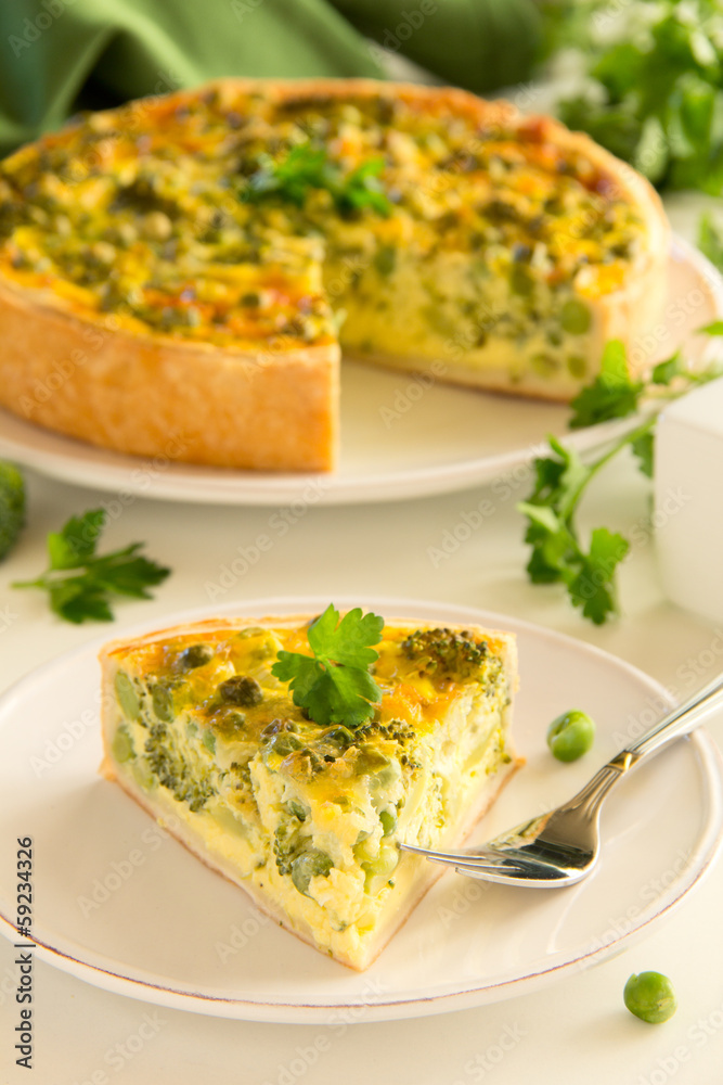 Vegetable pie with broccoli, peas and cheese.