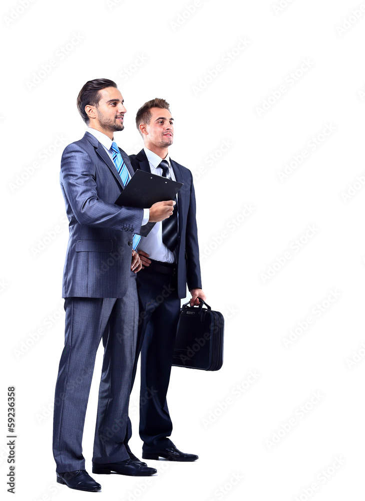 Two businessman looking at white background Two businessman looking at white background