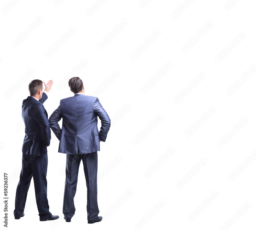 Two businessman looking at white background Two businessman looking at white background