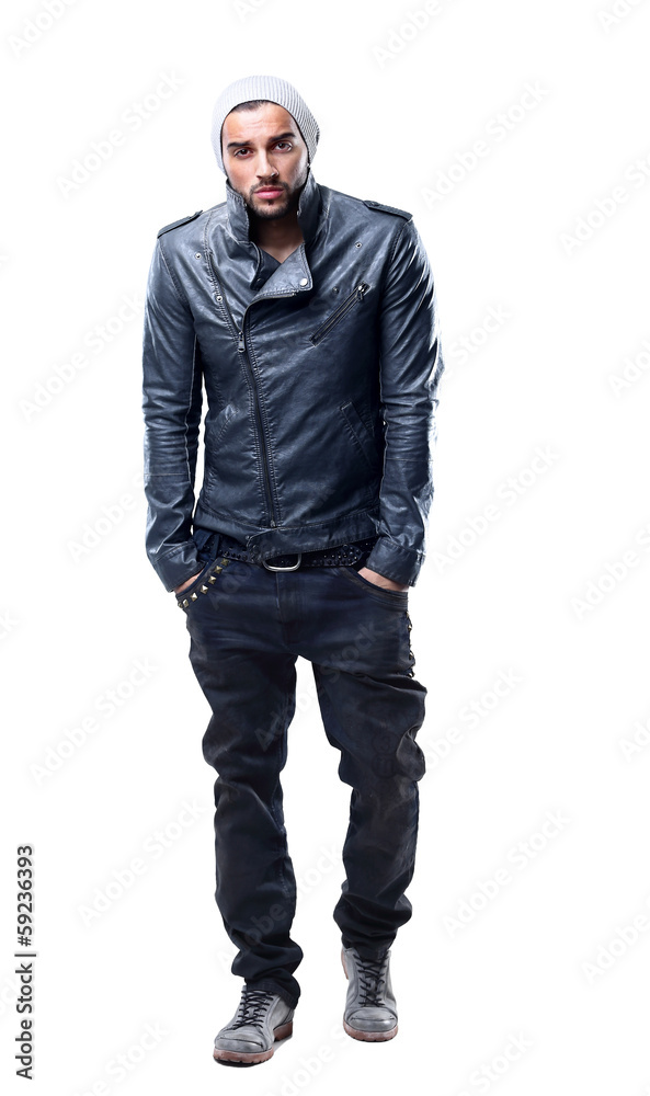 Stylish young man posing and looking at camera Stylish young man posing and looking at camera