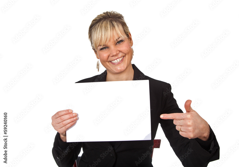 Studio portrait of a cute blond girl holding a piece of paper Studio portrait of a cute blond girl holding a piece of paper