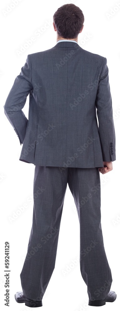 Businessman standing with hand on hip