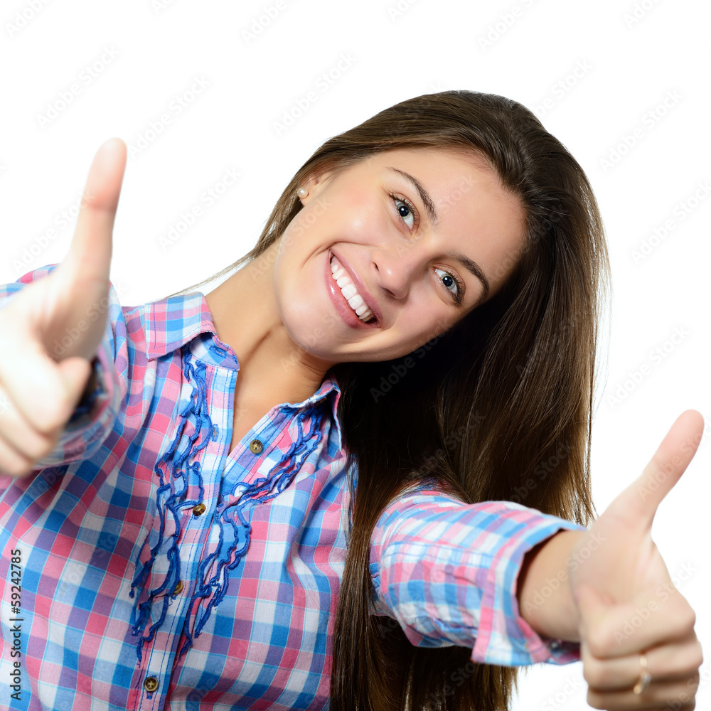 beautiful, confident and cheerful teenager girl showing thumbs u beautiful, confident and cheerful teenager girl showing thumbs u
