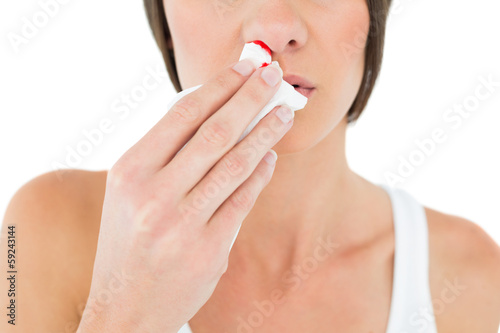 Close-up mid section of a woman with bleeding nose