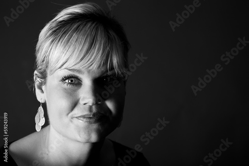 Studio portrait of a cute blond girl