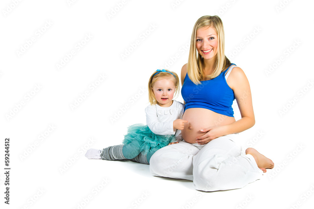 Pregnant woman with 2 zo daughter on white