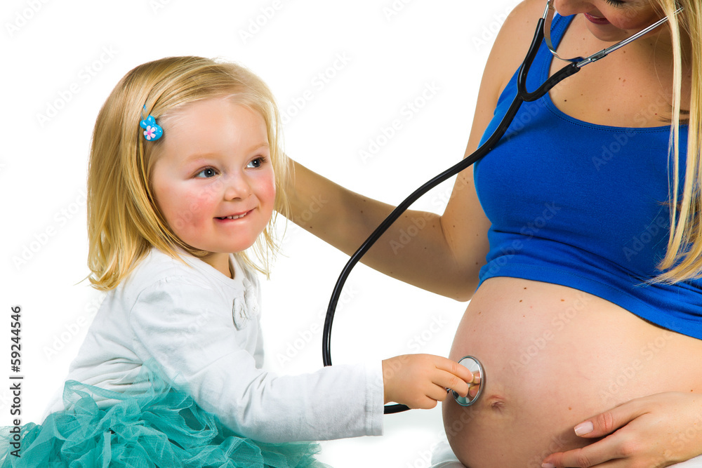 Pregnant woman with 2 zo daughter on white Pregnant woman with 2 zo daughter on white