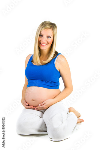 Pregnant woman isolated on white