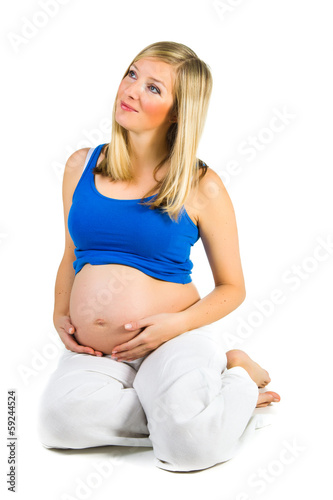 Pregnant woman isolated on white