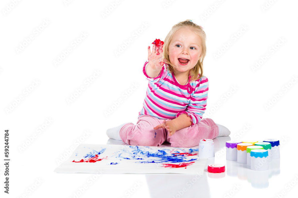 Child painting with fingers isolated on white Child painting with fingers isolated on white