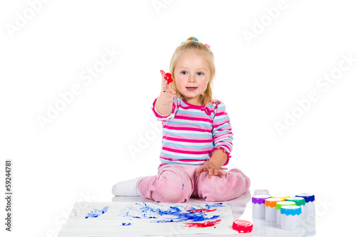 Child painting with fingers isolated on white
