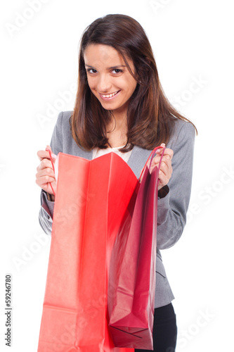 young woman with red shopping bag