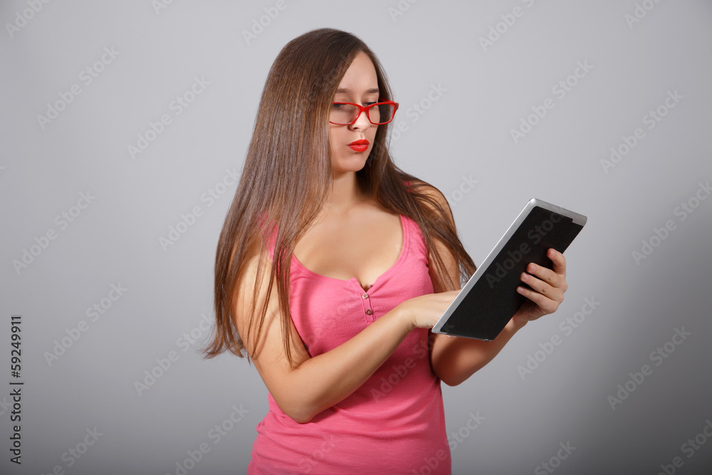 Naklejka premium Student works with tablet pc