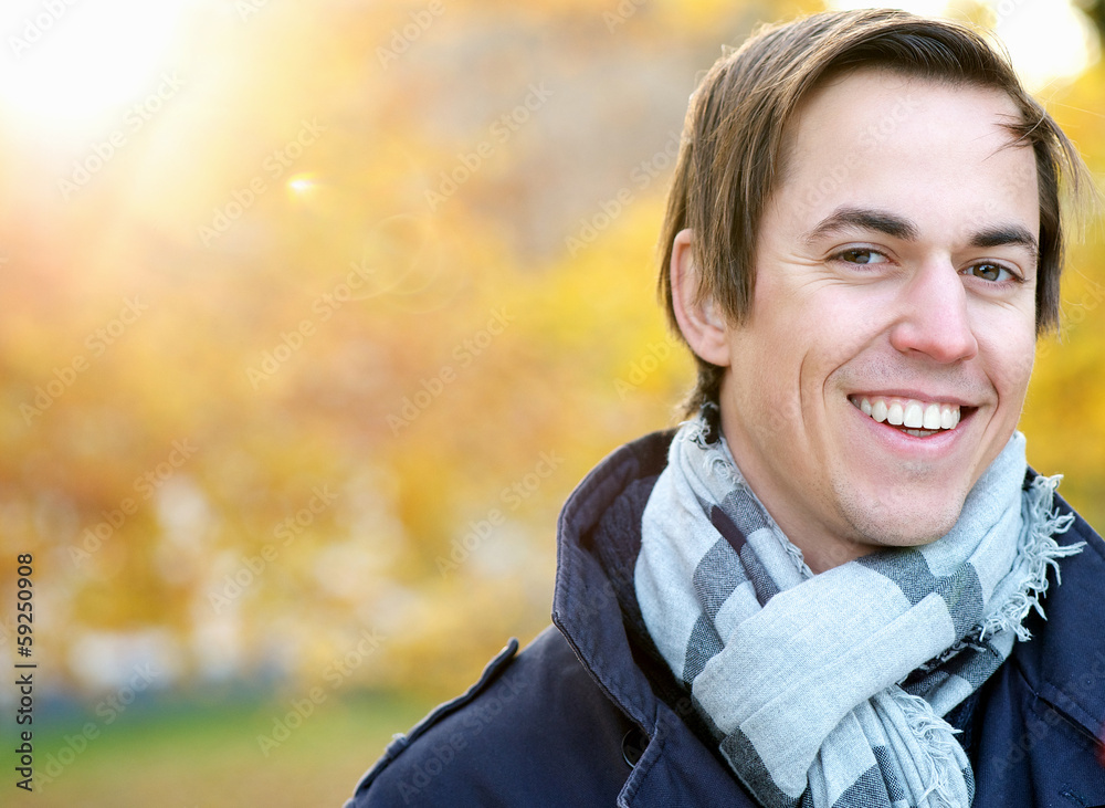 Portrait of a smiling young man standing outdoors Portrait of a smiling young man standing outdoors
