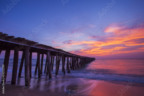Pier in sunrise © nopparatk