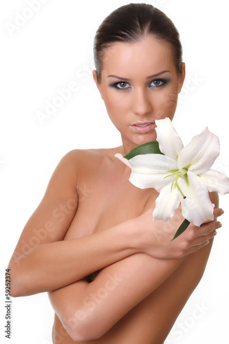 young beautiful girl with a lily