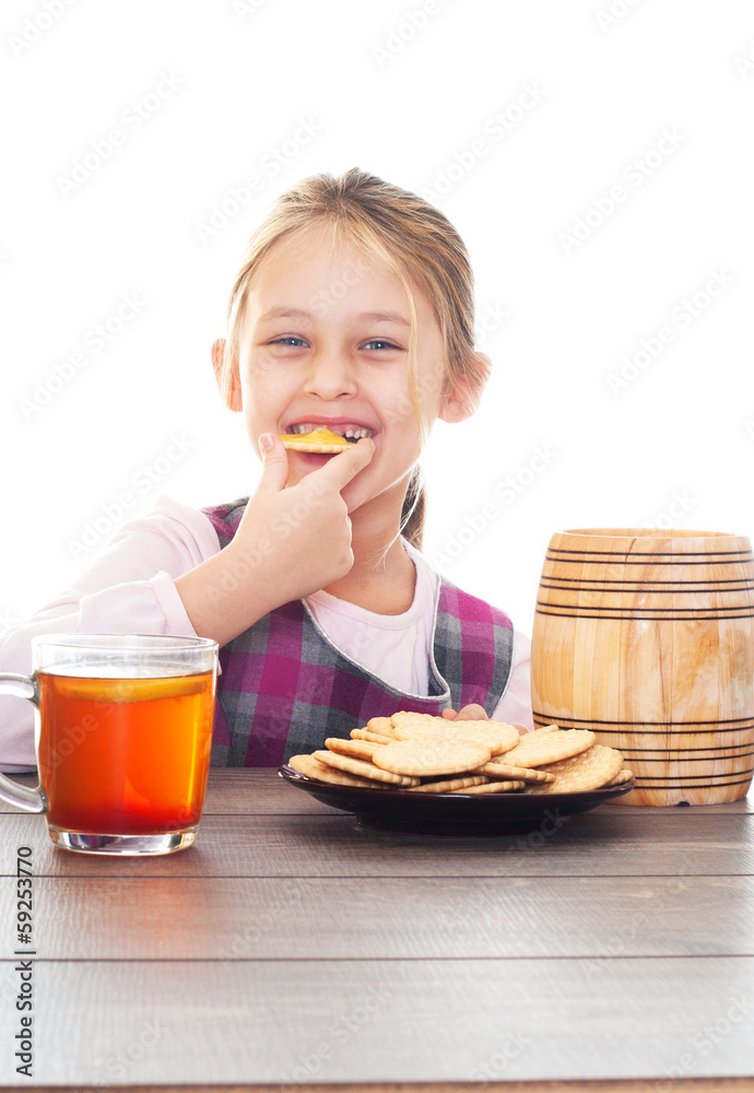 smiling girl eating cookie with honey smiling girl eating cookie with honey