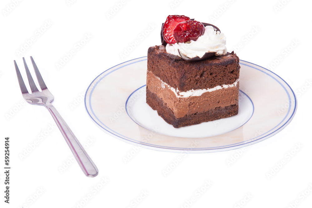 Chocolate cake with fork and strawberry Chocolate cake with fork and strawberry