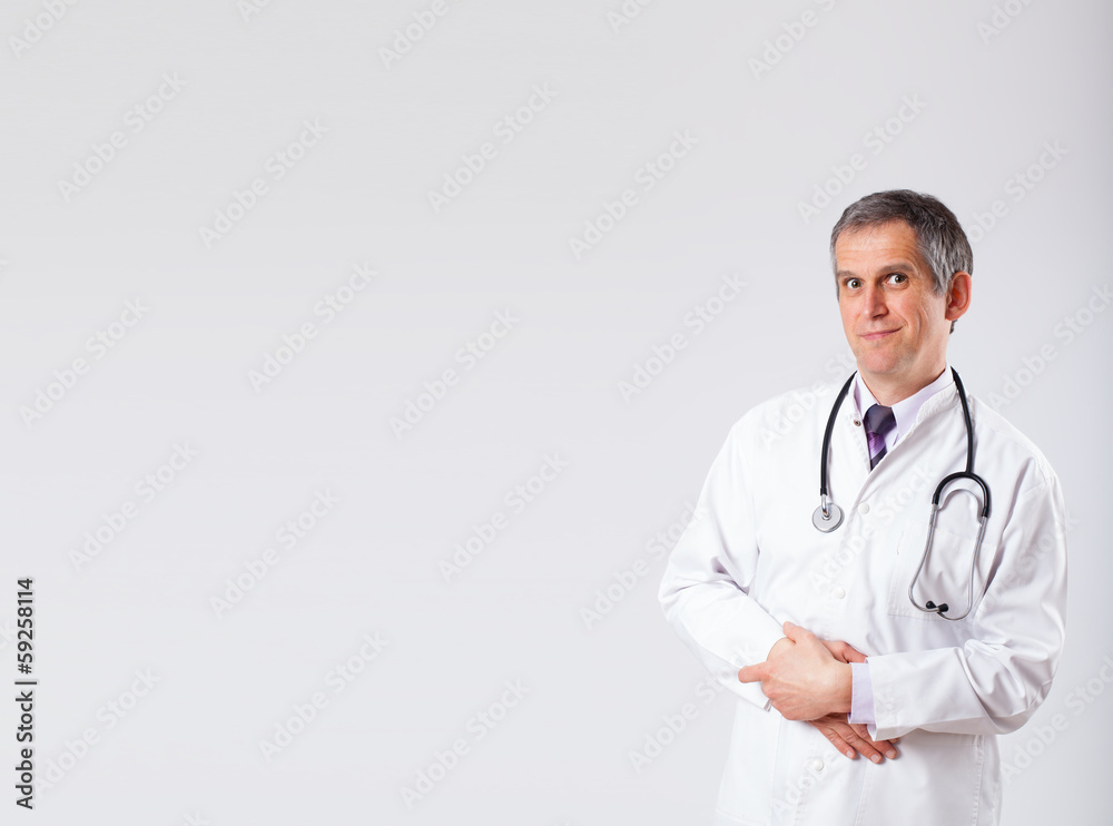 Doctor listening to empty copy space with stethoscope
