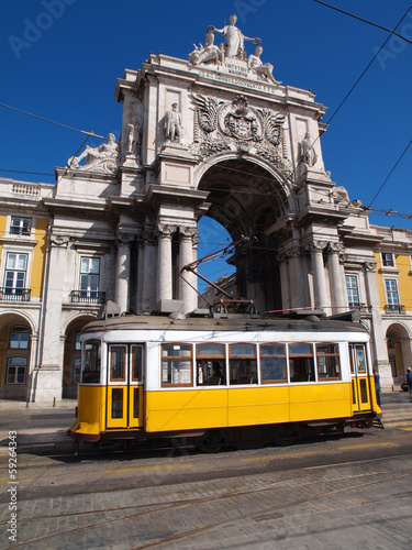Typical tram in Commerce Square, Lisbon, Portugal.