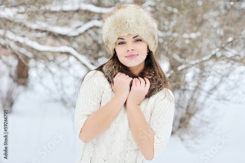 Snow winter woman portrait outdoors. Snowy white winter day © paultarasenko