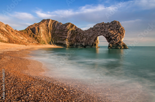 Durdle Dor a rock arch off the Jurassic Coast Dorset England photo