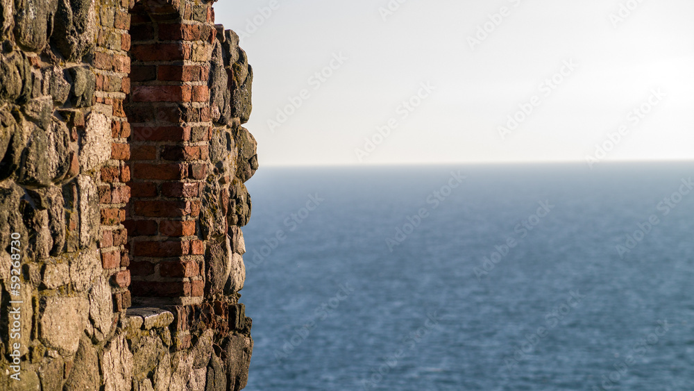 Ruin wall with view of the sea