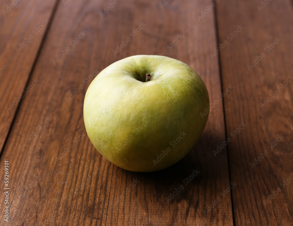 Apple on wooden background
