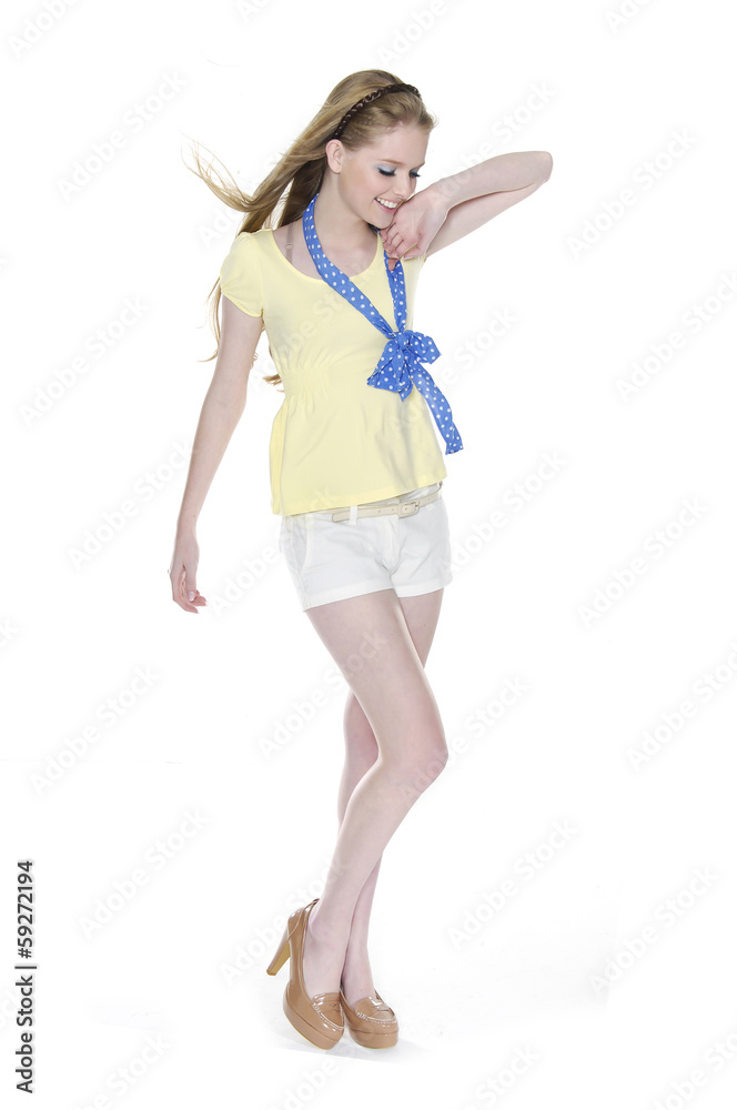 fashionable girl in leisure clothing posing in studio fashionable girl in leisure clothing posing in studio