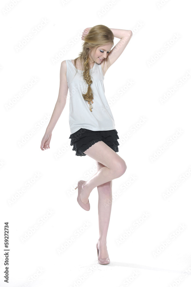 full length young woman in casual style clothing and shorts