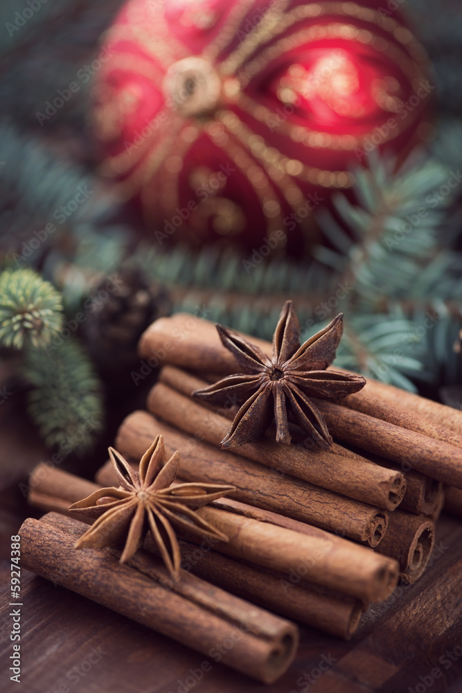 Christmas herbs: cinnamon sticks and star anise, close-up Christmas herbs: cinnamon sticks and star anise, close-up
