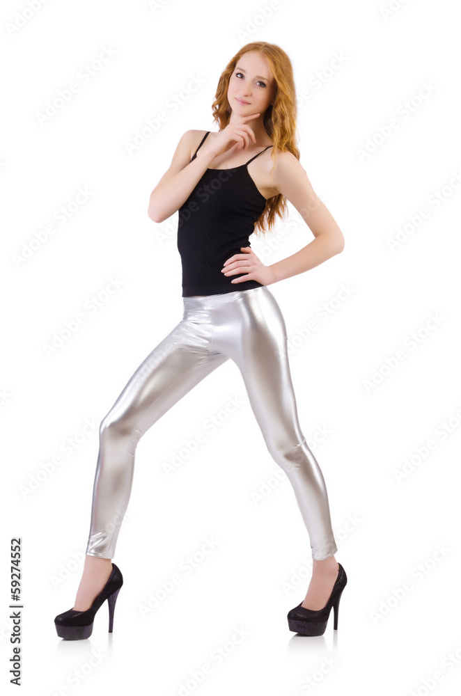 Fototapeta premium Young redhead girl in tight leggings