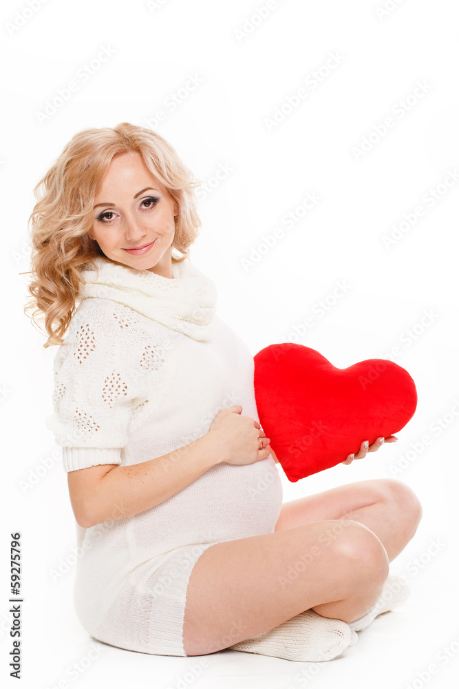 pregnant woman caressing her belly over white background pregnant woman caressing her belly over white background