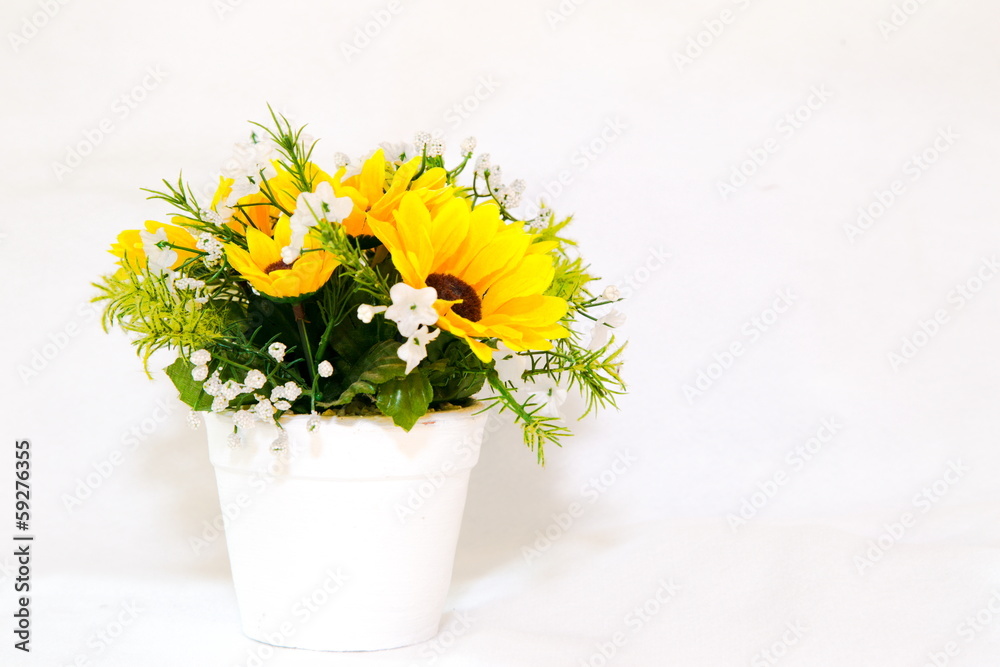 sunflowers in a vase and space for text