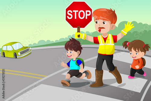 Flagger and kids crossing the street