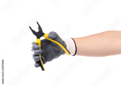 Hand in gloves holding pliers.