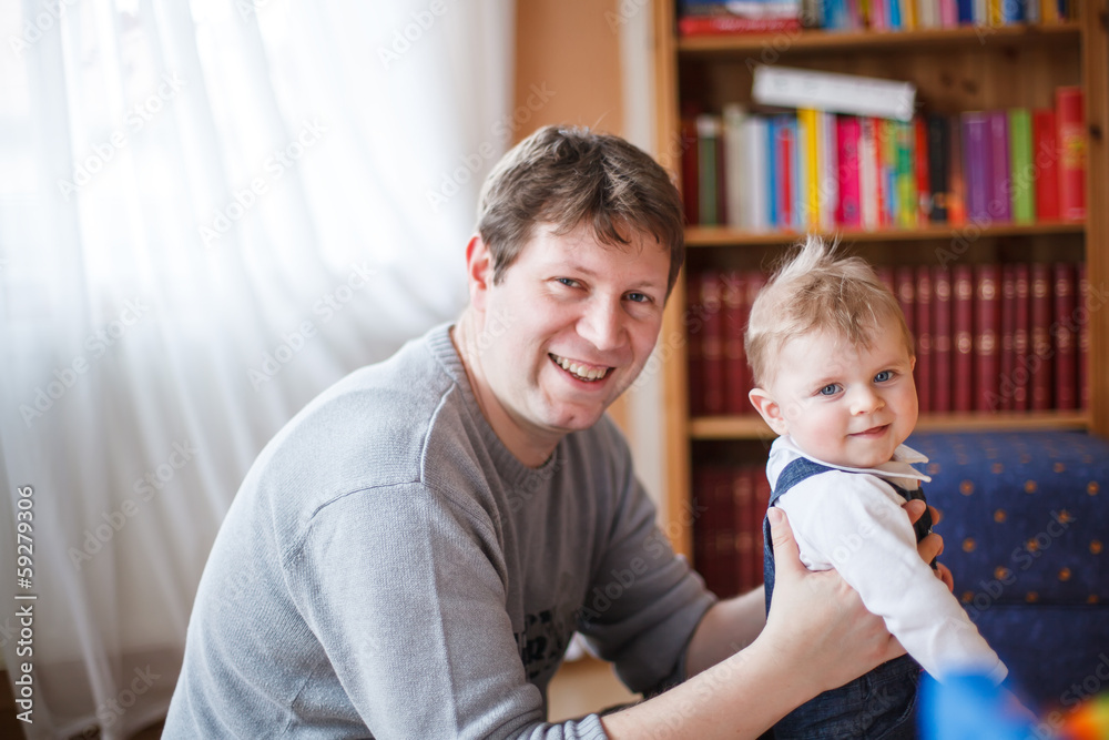 Young father and little baby boy of six months Young father and little baby boy of six months
